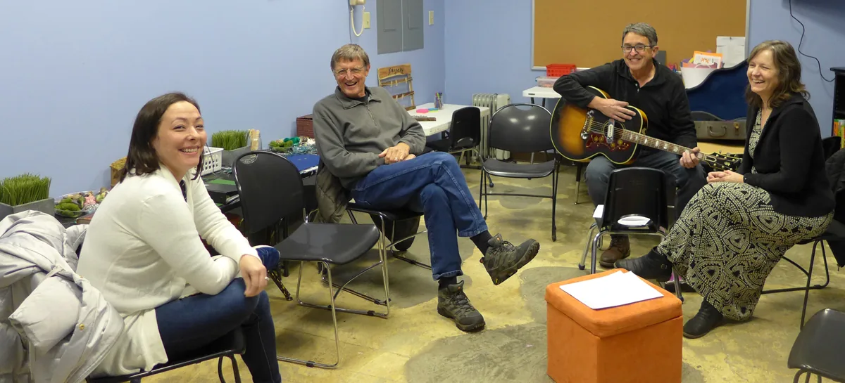 An Oasis Community Church small group meeting together in a home